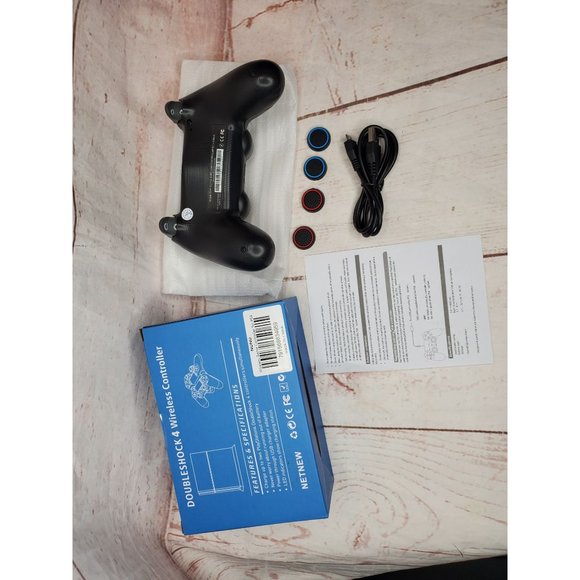 Black Wireless Controller With 4 Extra Grips And Charger Cord - Picture 5 of 8